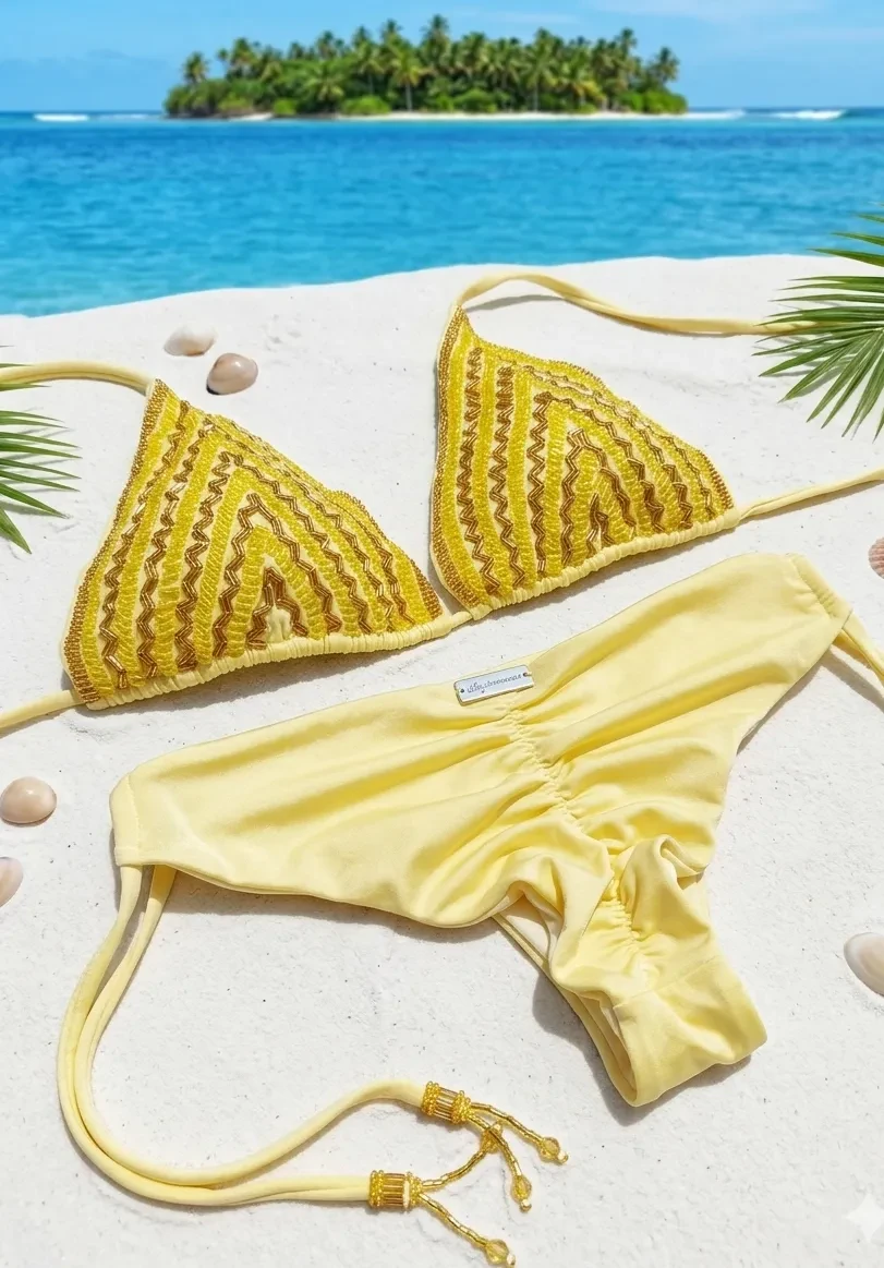 Two-piece string bikini Julieth model adorned with rhinestones and hand embroidery, Lycra fabric with UV filter.